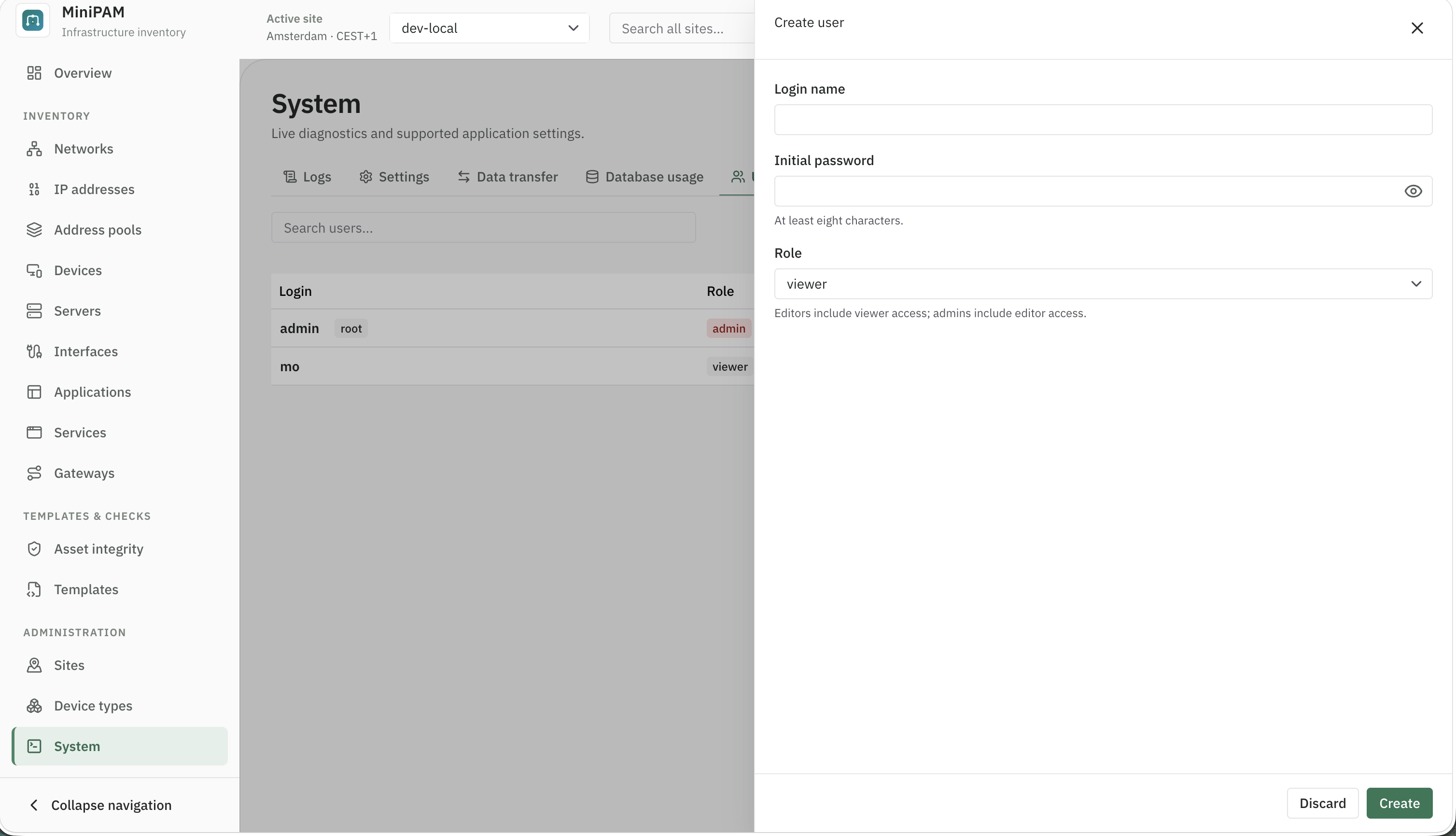 Create user dialog with login name, initial password, role, and status